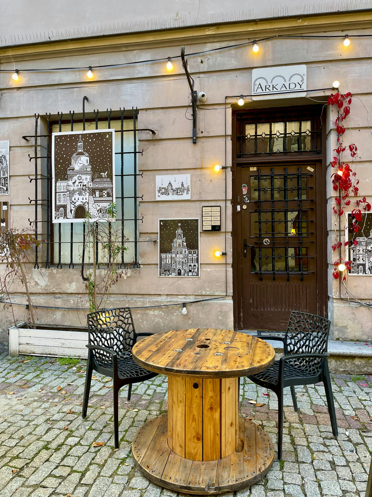 Brew Haven Cafe storefront with warm lighting